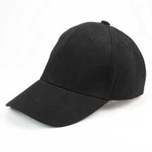 Detailed side view of classic plain black cotton baseball cap with stitched brim