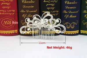 Detailed view of bridal hair comb with pearls and rhinestones measuring 11cm by 6cm