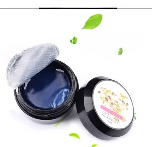 Detail view of 8ml blue solid nail glue in a black jar with protective silver foil seal