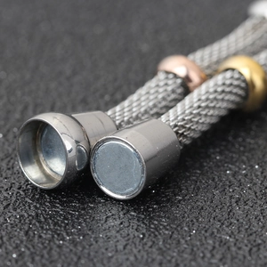Detail of 4mm stainless steel mesh bracelet with magnetic clasp and gold beads