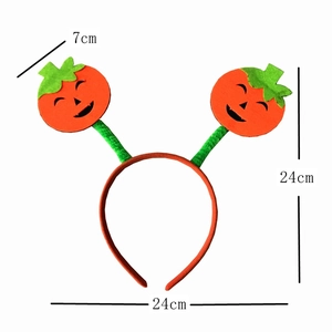 Detail of Halloween pumpkin headband showing dimensions 24cm height with orange felt icons