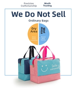 Detail showing dry and wet compartments of waterproof storage bags with smile graphics