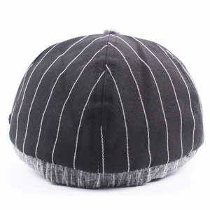 Retro pinstripe cotton newsboy cap for men and women featuring a black and gray patchwork design