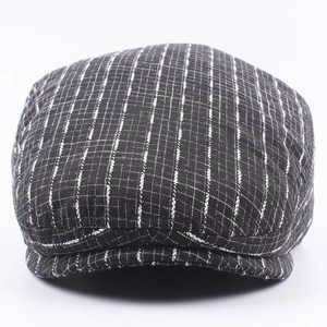 Classic British style newsboy cap with black and white plaid pattern for autumn and winter