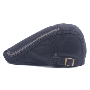 Men's washed cotton flat cap with gray contrast stitching and vintage metal buckle