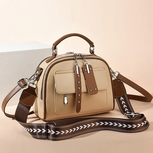Beige and brown contrast crossbody bag with wide textile strap and top handle