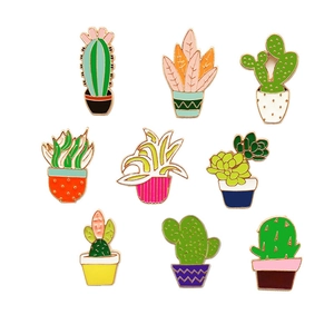 9-piece set of colorful enamel cactus and succulent plant pins on white background