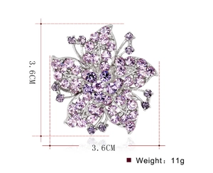 Detail view of purple crystal flower brooch with silver metal base and 3.6cm dimensions
