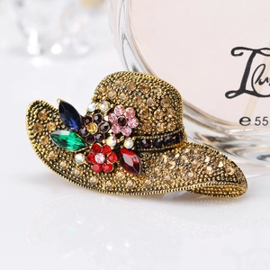 Vintage gold sun hat brooch with multicolor crystals and amber rhinestones on gold alloy