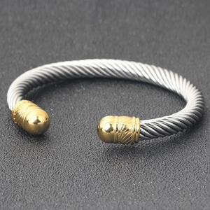 Minimalist 7mm twisted cable stainless steel cuff bracelet with golden ends
