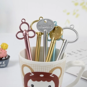 Set of five creative key-shaped neutral pens in metallic pink, gold, silver, and blue tones