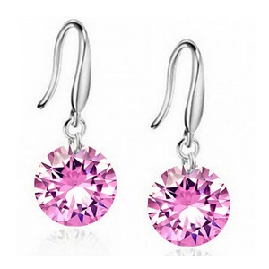 Macro detail of 8mm pink round-cut crystal earrings with silver French hook wires