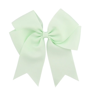 Detail of a large light mint green grosgrain ribbon bow hair clip with fishtail streamers