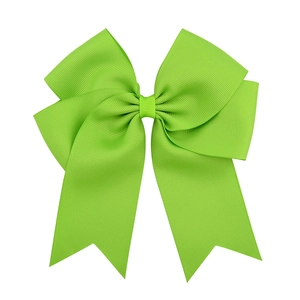 Detail of a 6-inch grass green ribbed grosgrain ribbon bow with a fishtail streamer