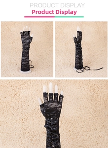 Detailed close-up of floral lace texture and adjustable ribbon tie on fingerless gloves
