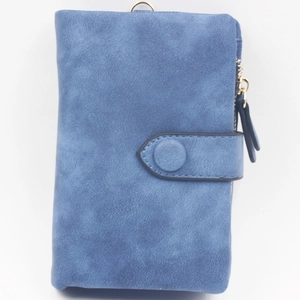 Detail view of the matte blue trifold wallet with a gold zipper and metal D-ring attachment