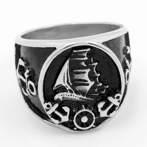 Vintage nautical stainless steel signet ring featuring a sailing boat and anchors