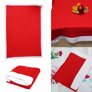 Detail of red and white non-woven Christmas chair cover with textured fabric close-up