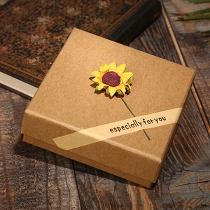 Kraft paper jewelry box with sunflower decor and 'especially for you' tag on wood