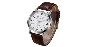 Detail view of business quartz watch with white dial and brown leather strap on wood