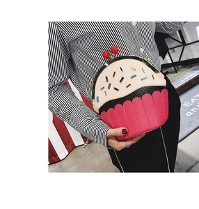 Detail of creative cupcake shoulder bag with colorful crystal studs and PU leather texture