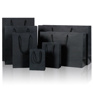 Set of black matte paper gift bags in various sizes with durable rope handles