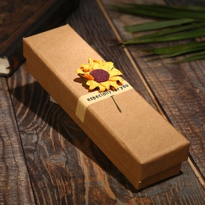 Brown kraft paper gift box with yellow sunflower and 'Especially for You' ribbon detail