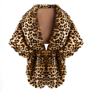 Detailed macro texture of leopard print faux fur shawl with soft brown and black patterns