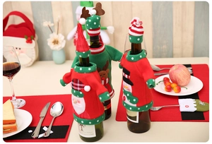 Detailed close-up of festive Christmas wine bottle covers with knitted sweater designs