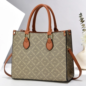 Classic large tote bag with retro monogram pattern and brown leather handles for women
