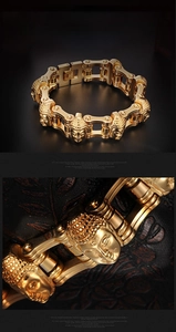 Macro view of 316L stainless steel gold biker chain bracelet with Buddha head detail
