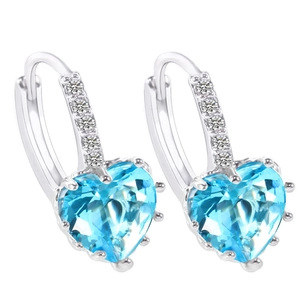 Sparkling silver hoop earrings with heart-shaped blue stones and zircon accents