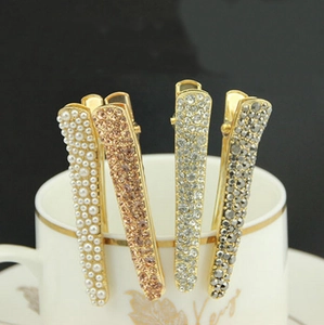 Set of 4 gold alloy duckbill hair clips with sparkling rhinestones and white pearls