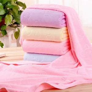 Plush microfiber bath towel with embossed bear patterns in soft macabre pastel colors