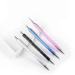 Detailed view of four metallic mechanical pencils in silver, black, blue, and pink colors