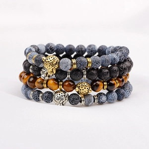 Tiger eye and black onyx beaded bracelets with leopard head metal accents in a 4-piece set