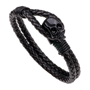 Men's black braided leather bracelet featuring a polished metal skull charm fastener