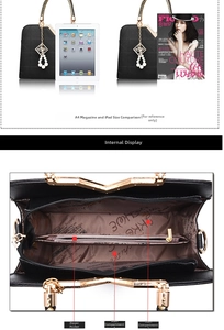 Detail view of black quilted handbag interior compartments and A4 size capacity