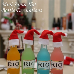 Set of 4 mini red Santa hats for wine bottle decoration and festive table settings