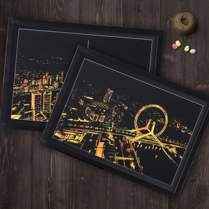 Framed city night view scratch art set with elegant black frames on wooden table