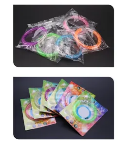 Macro view of colorful acrylic LED flashing bracelets with bubbles texture and packaging