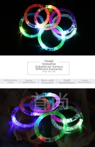 Macro shot showing glowing LED acrylic bracelets with decorative bubbles in multiple colors