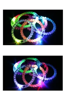 Close-up of colorful glowing LED acrylic bead bracelets for night parties and festivals