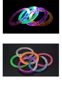 Macro view of colorful LED bubble bracelets in dark and light modes for party decor