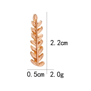 Rose gold leaf earrings with 2.2cm length and 0.5cm width dimensions shown