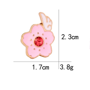 Pink cherry blossom enamel brooch with red crystal and white wing detail and dimensions