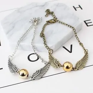 Macro view of adjustable Harry Potter Golden Snitch bracelet with zircon wings