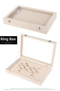 Detail view of 35x24.5x5 cm jewelry display case with glass lid and velvet ring slots