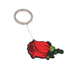 Close-up of a red rose flower keychain made of soft PVC material with a silver metal ring