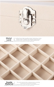Detail showing the silver vintage metal lock and soft beige velvet interior of jewelry box